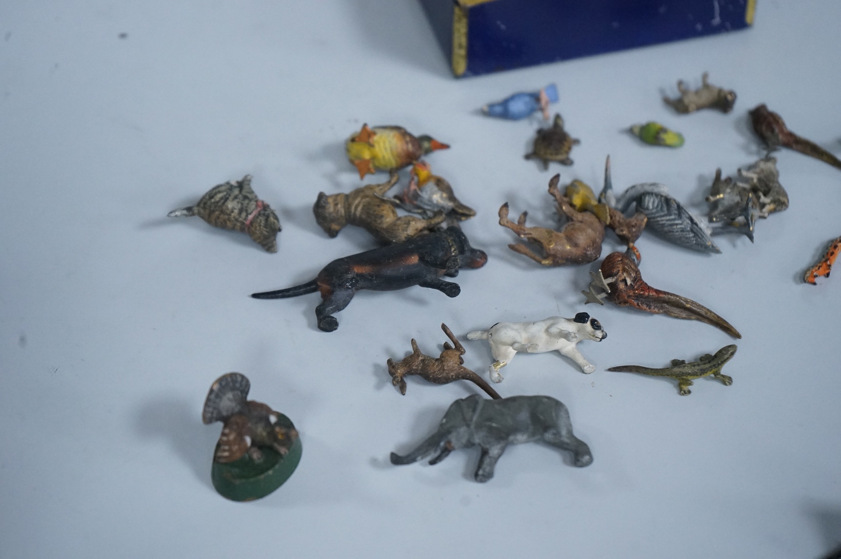 A group of Austrian miniature cold painted bronze and spelter animal and bird figures, largest 6cm wide